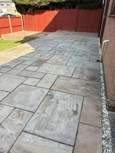 Sandstone patio before professional patio cleaning Bristol